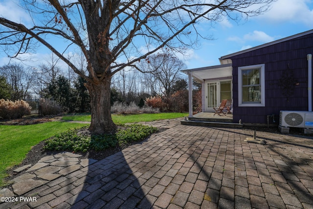 view of patio featuring ac unit