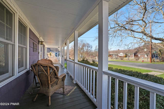 wooden deck featuring a porch