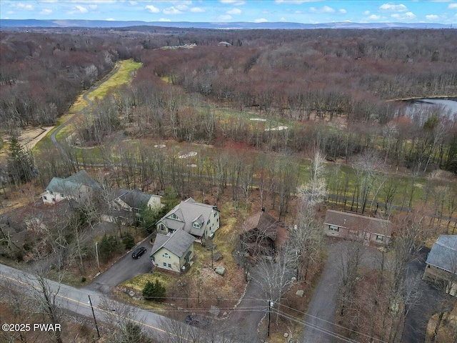 bird's eye view featuring a view of trees