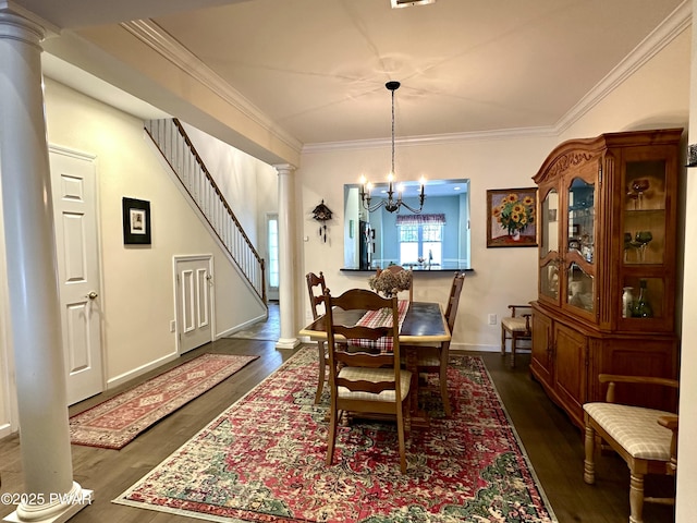 dining area with decorative columns, dark wood-style floors, stairs, crown molding, and a notable chandelier