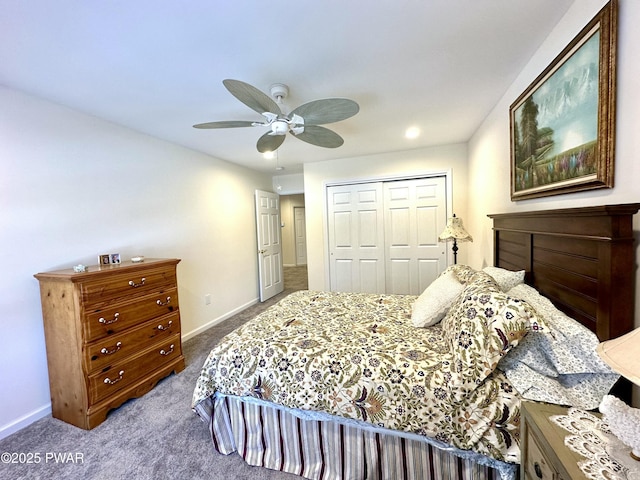 carpeted bedroom with a closet, ceiling fan, and baseboards