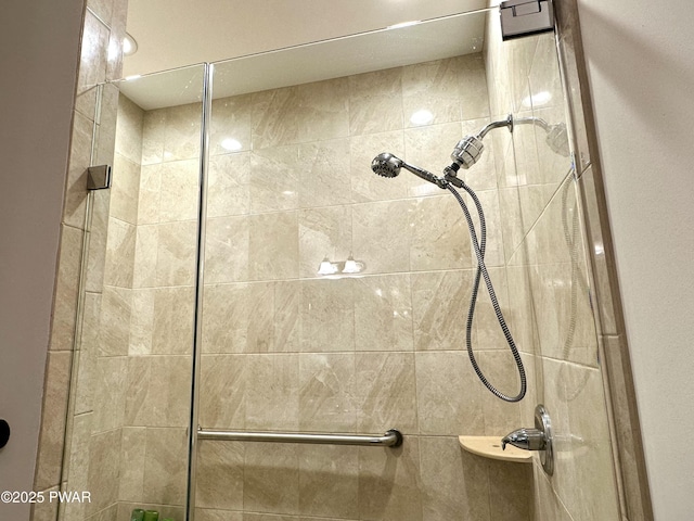 bathroom with a shower stall