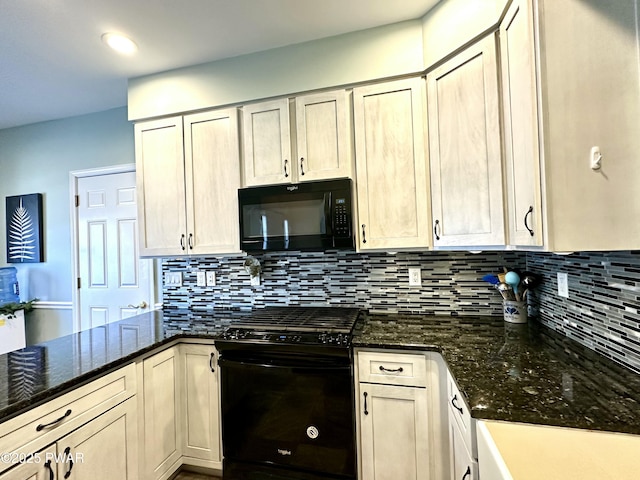 kitchen featuring dark stone countertops, black appliances, and tasteful backsplash