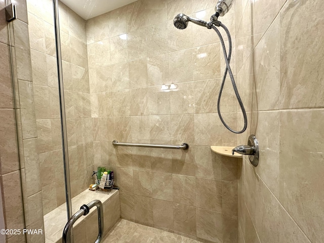 bathroom featuring a stall shower