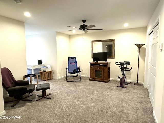 sitting room with carpet floors, recessed lighting, and baseboards