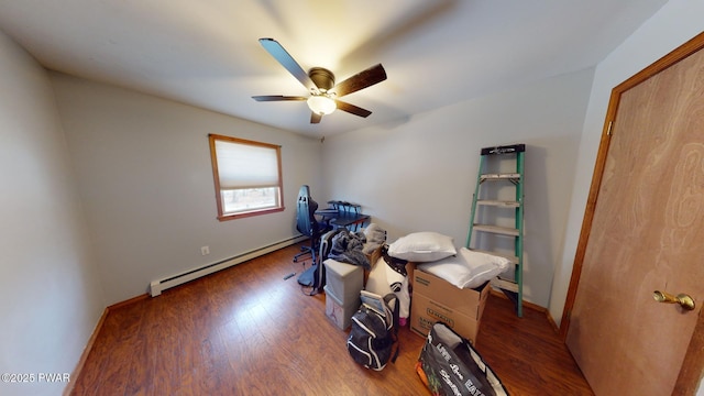 misc room with ceiling fan, a baseboard radiator, and dark hardwood / wood-style floors