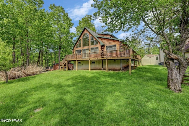 1007 Apache Ct, Lake Ariel, PA 18436 - back of property featuring log siding, a deck, a lawn, and stairway