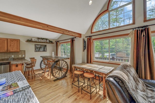 1007 Apache Ct, Lake Ariel, PA 18436 - dining space featuring light wood finished floors, high vaulted ceiling, and beamed ceiling
