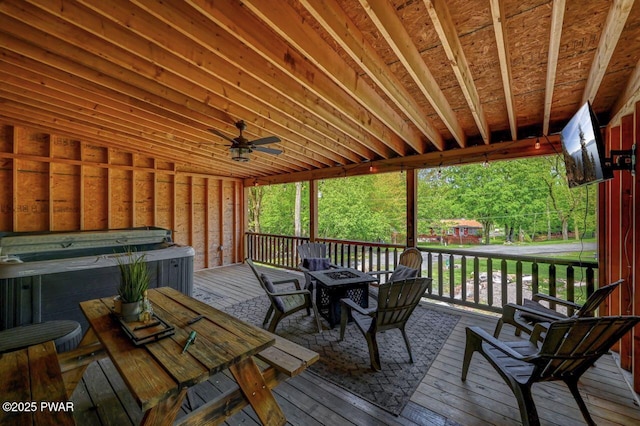 1007 Apache Ct, Lake Ariel, PA 18436 - wooden terrace featuring a hot tub, a ceiling fan, outdoor dining space, and a fire pit