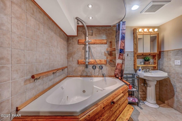 1007 Apache Ct, Lake Ariel, PA 18436 - full bath with tile walls, recessed lighting, a combined bath / shower with jetted tub, and tile patterned floors