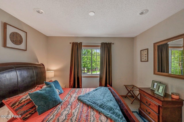 1007 Apache Ct, Lake Ariel, PA 18436 - carpeted bedroom featuring a textured ceiling and recessed lighting