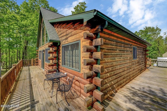 1007 Apache Ct, Lake Ariel, PA 18436 - view of side of property featuring log siding, a deck, and roof with shingles