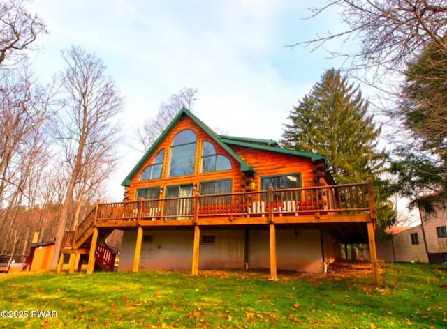 1007 Apache Ct, Lake Ariel, PA 18436 - rear view of house with a deck, log siding, stairs, and a yard