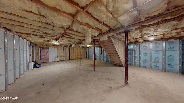 103 Windwards Ln, Dingmans Ferry, PA 18328 - unfinished basement featuring stairway