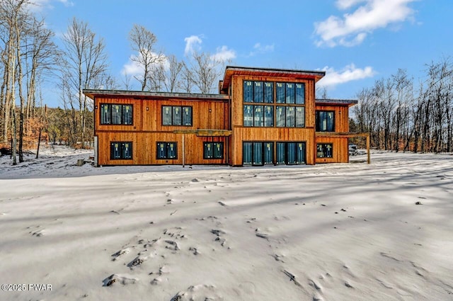 view of snow covered property