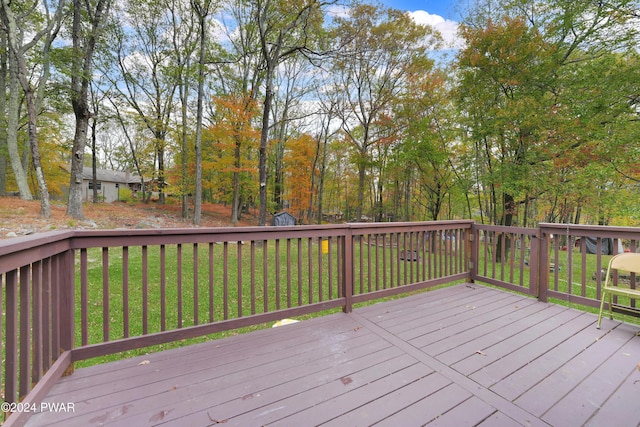 deck featuring a yard