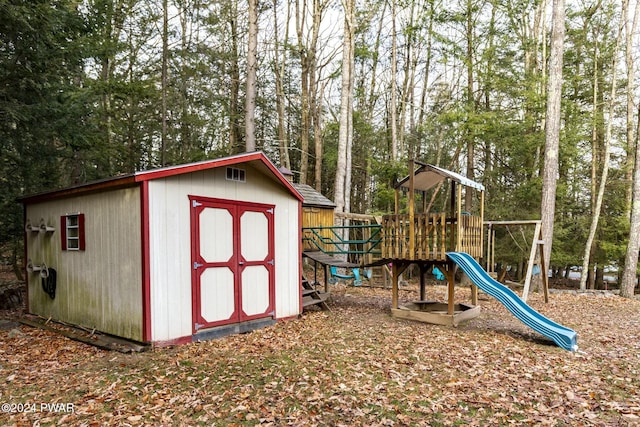 view of outdoor structure with a playground