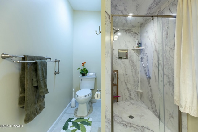 bathroom featuring toilet, tile patterned floors, and walk in shower