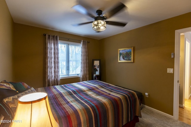 bedroom with carpet flooring and ceiling fan