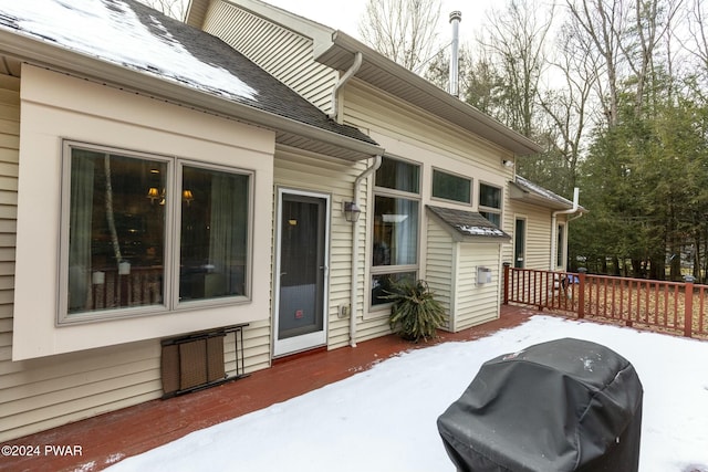 exterior space featuring grilling area and a wooden deck