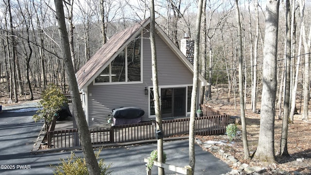 rustic home with a chimney