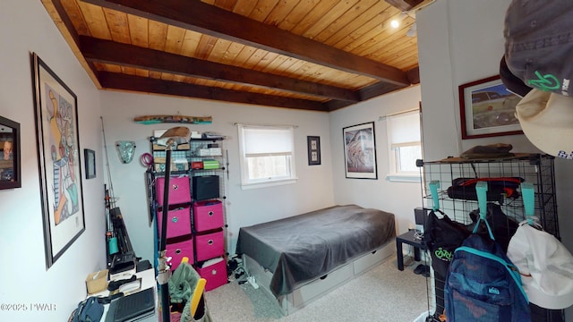 bedroom featuring wood ceiling, multiple windows, and beam ceiling