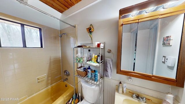 bathroom with shower / tub combination and toilet