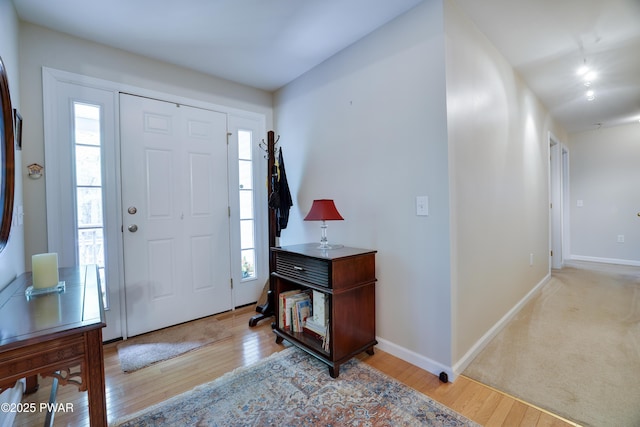 102 Circle Dr, Milford, PA 18337 - foyer featuring plenty of natural light and wood finished floors