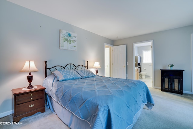102 Circle Dr, Milford, PA 18337 - carpeted bedroom with baseboards and ensuite bathroom