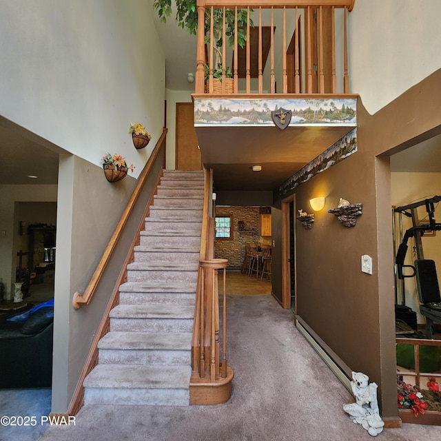 111 Ranger Rd, Greeley, PA 18425 - stairs with baseboards, carpet floors, and a high ceiling