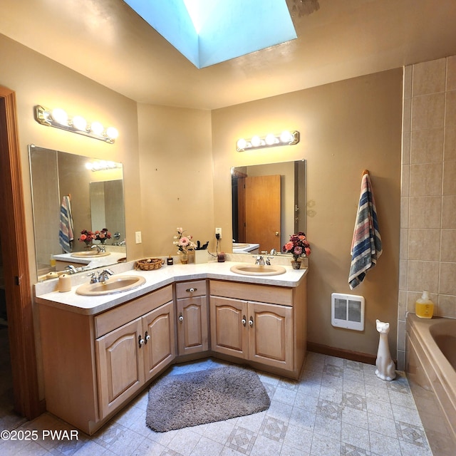 111 Ranger Rd, Greeley, PA 18425 - full bath with a sink, a skylight, double vanity, and a tub