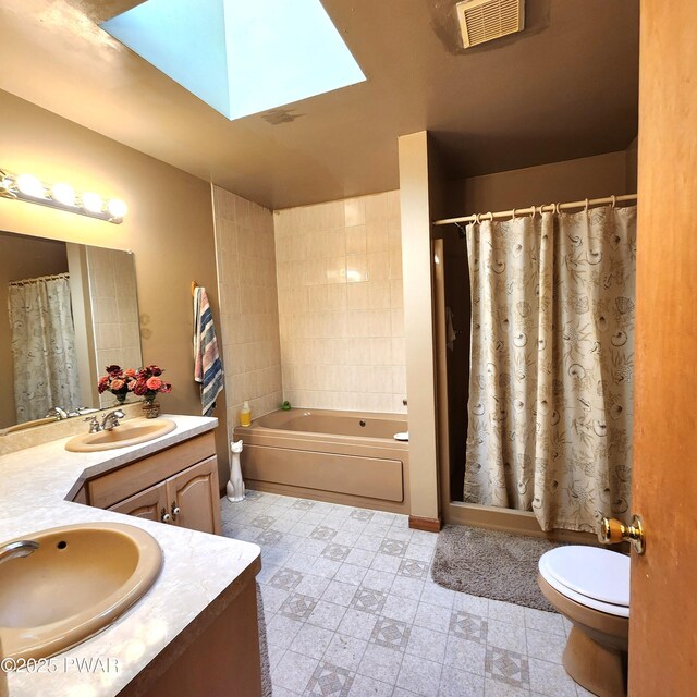 111 Ranger Rd, Greeley, PA 18425 - full bath with visible vents, toilet, a skylight, tile patterned floors, and vanity