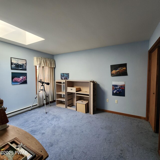 111 Ranger Rd, Greeley, PA 18425 - bedroom featuring baseboards, carpet floors, and a skylight