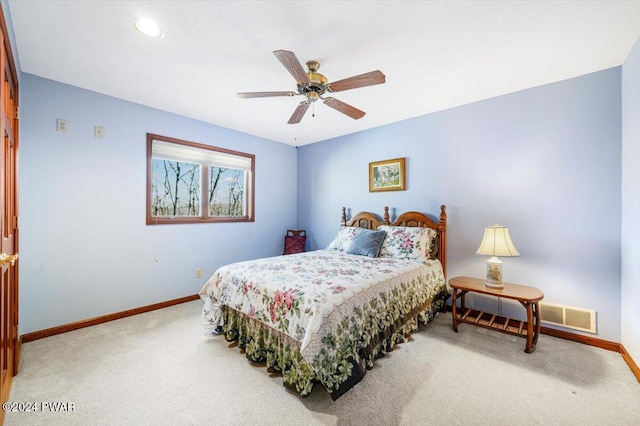 carpeted bedroom featuring ceiling fan