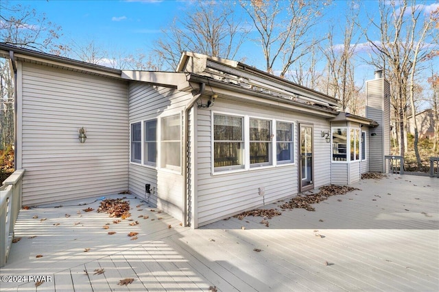 view of front facade featuring a wooden deck