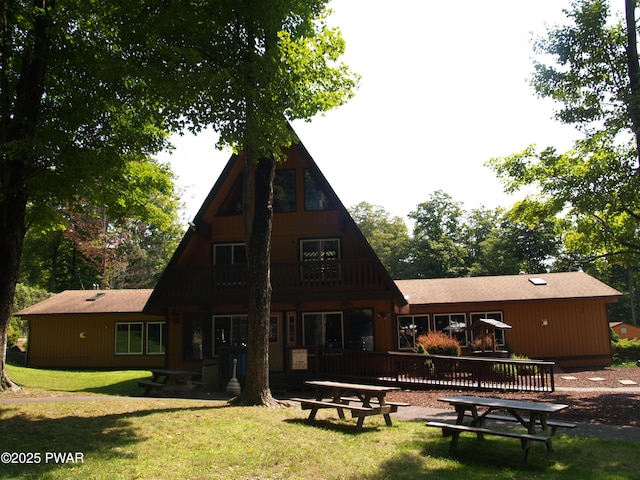 1032 Deer Field Ct, Lake Ariel, PA 18436 - rear view of property featuring a lawn and a wooden deck