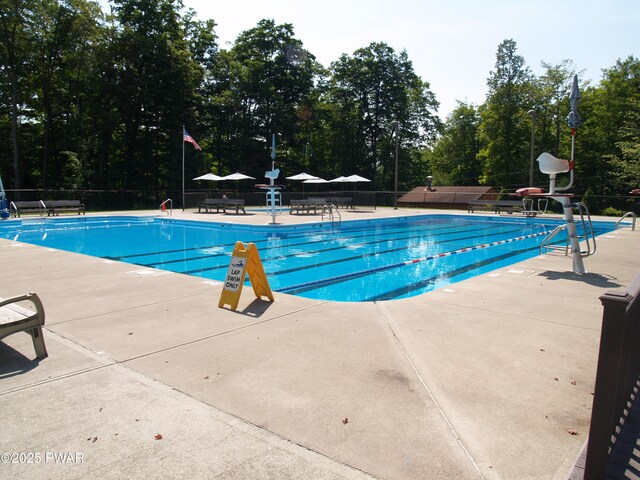 1032 Deer Field Ct, Lake Ariel, PA 18436 - community pool featuring a patio and view of scattered trees