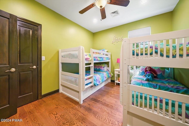 bedroom featuring ceiling fan and wood-type flooring