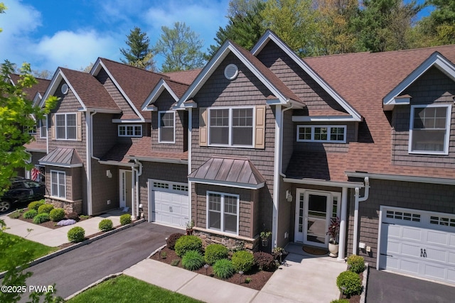 803 Macintosh Way, Matamoras, PA 18336 - craftsman house featuring aphalt driveway, roof with shingles, a standing seam roof, metal roof, and an attached garage