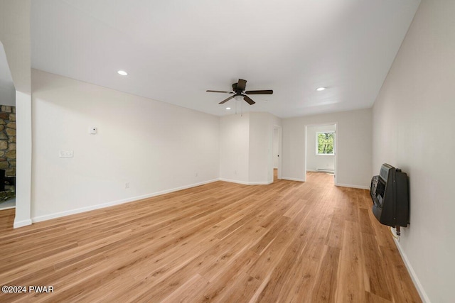 109 Widgeon Ln, Lords Valley, PA 18428 - unfurnished living room with heating unit, a ceiling fan, light wood-style floors, recessed lighting, and a fireplace