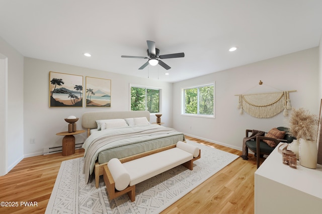 109 Widgeon Ln, Lords Valley, PA 18428 - bedroom featuring light wood-style flooring, recessed lighting, ceiling fan, and a baseboard radiator