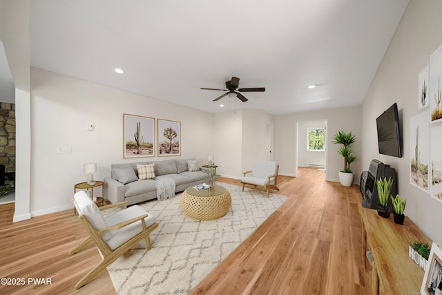 109 Widgeon Ln, Lords Valley, PA 18428 - living room with ceiling fan, light wood-style floors, recessed lighting, a baseboard radiator, and a fireplace