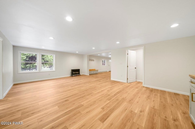 unfurnished living room featuring light hardwood / wood-style flooring