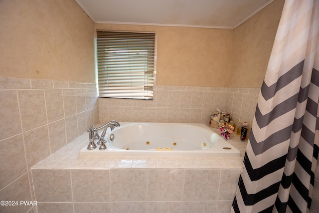 bathroom with ornamental molding and plus walk in shower