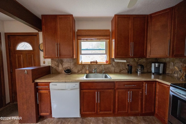 kitchen with white dishwasher, decorative backsplash, sink, and stainless steel range with electric cooktop