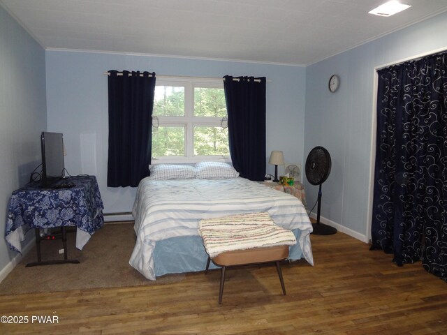 115 Eastwood Dr, Greentown, PA 18426 - bedroom featuring ornamental molding, wood finished floors, and a baseboard radiator