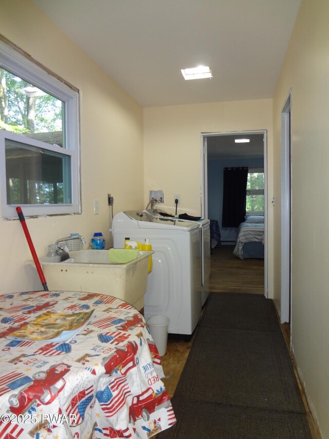 115 Eastwood Dr, Greentown, PA 18426 - bedroom with washing machine and dryer and multiple windows