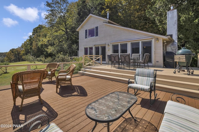 wooden terrace with grilling area