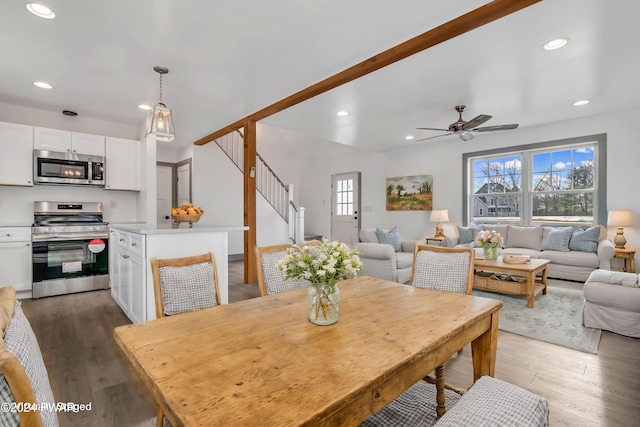 5 Lakeville Ct, Lakeville, PA 18438 - dining room with wood finished floors, recessed lighting, ceiling fan, and stairway