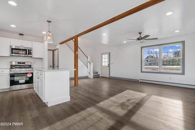 kitchen with white cabinetry, hanging light fixtures, a baseboard radiator, plenty of natural light, and appliances with stainless steel finishes